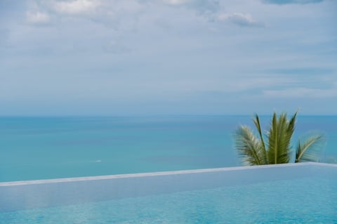Ocean view from luxury poolside in Thailand