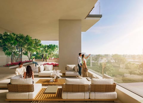 Modern penthouse terrace with wicker furniture, lounging guests, and panoramic city views through floor-to-ceiling windows