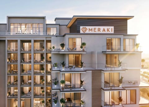 Modern residential building with Meraki branding, featuring multiple illuminated balconies with plants and contemporary architecture at dusk